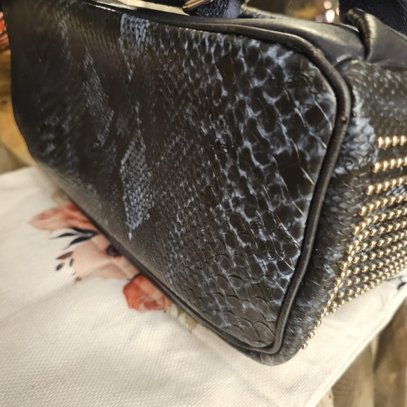 MCM Dark Snake Pattern Backpack - Picture 14 of 16